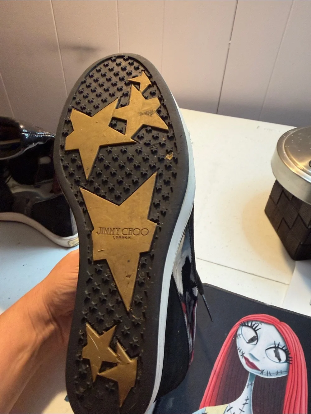 Jimmy Choo Black Wedge High-Top Sneakers with Gold Accents